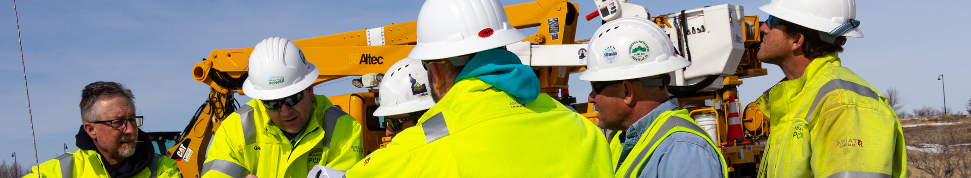 photo of workers planning a fiber installation